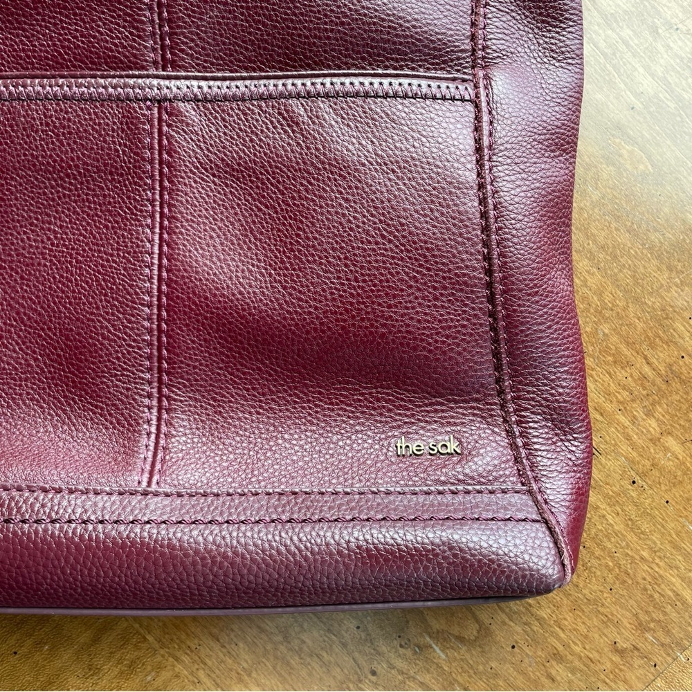 The Sak Burgundy Pebbled Leather Crossbody Bag with Adjustable Webbing Strap - Picture 12 of 12